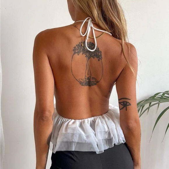 Ruffle Halter Backless Top NWOT
Size Small - Picture 2 of 6